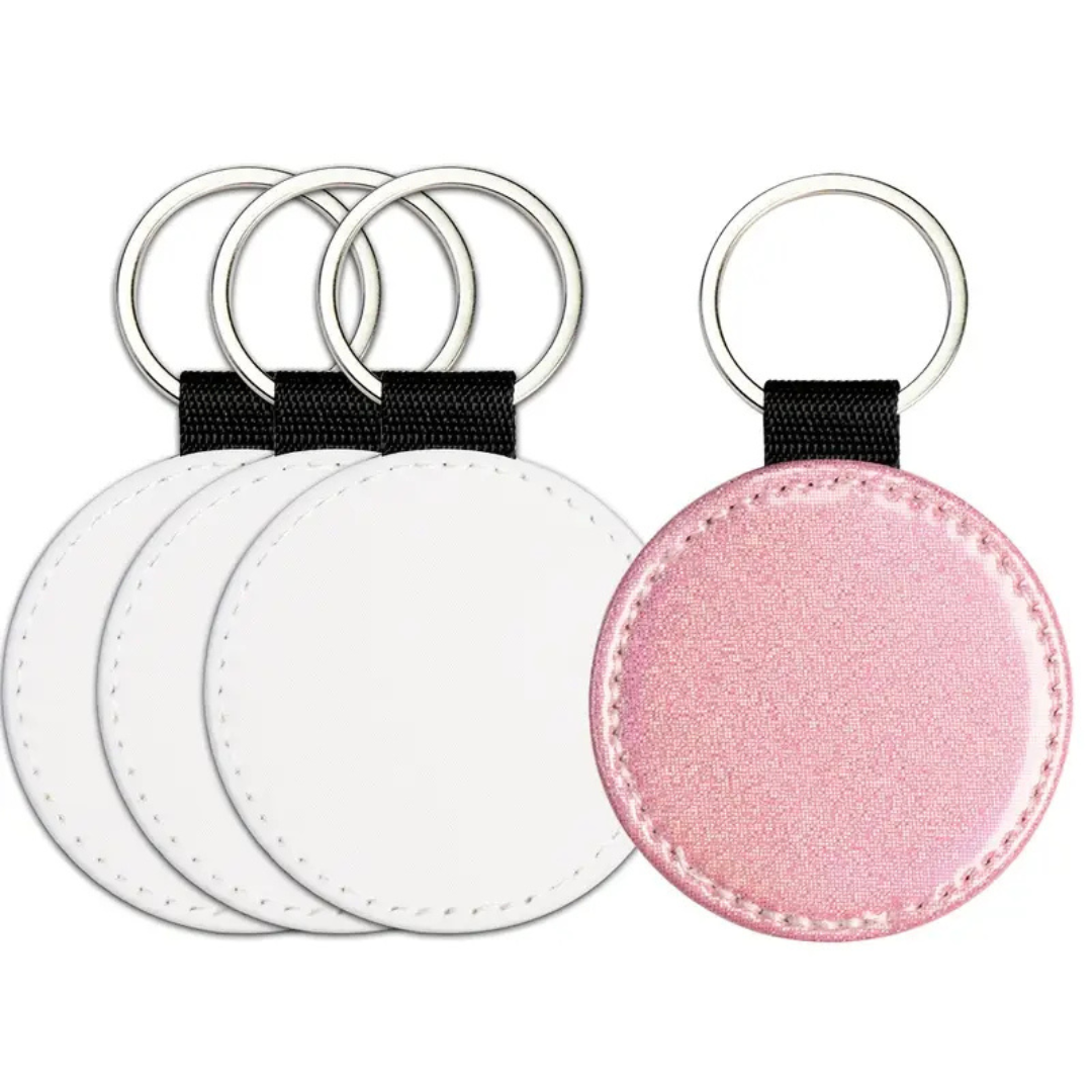 Sleutelhanger met opdruk, rond en met glitters aan de achterzijde